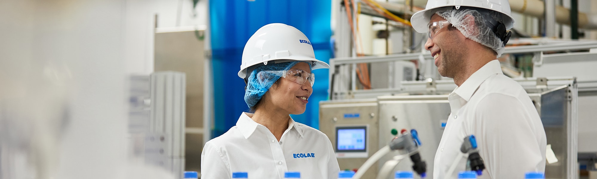 Ecolab experts in a dairy processing plant
