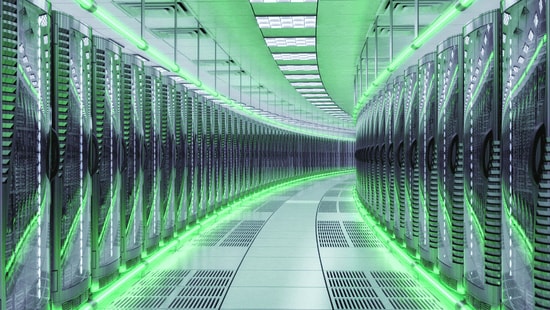 A futuristic data center illuminated with green LED lights